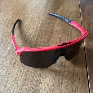 Oakley Sutro red sunglasses with gray lenses